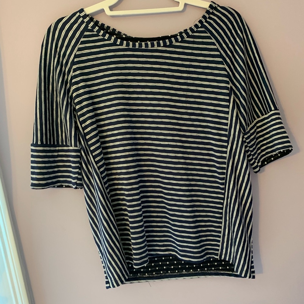 white and navy striped top.